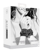 Ouch Shots Ouch Black & White Bonded Leather Hand/Ankle Cuffs - Black